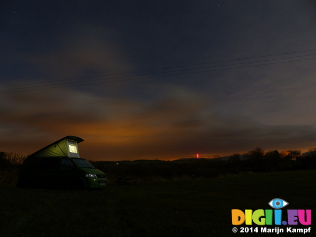 FZ003671 Campervan with lit up popup at night